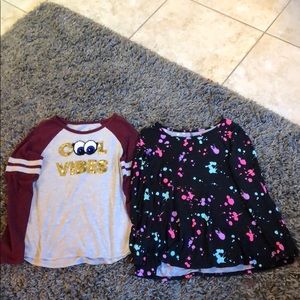2 girls Justice long-sleeved tees.